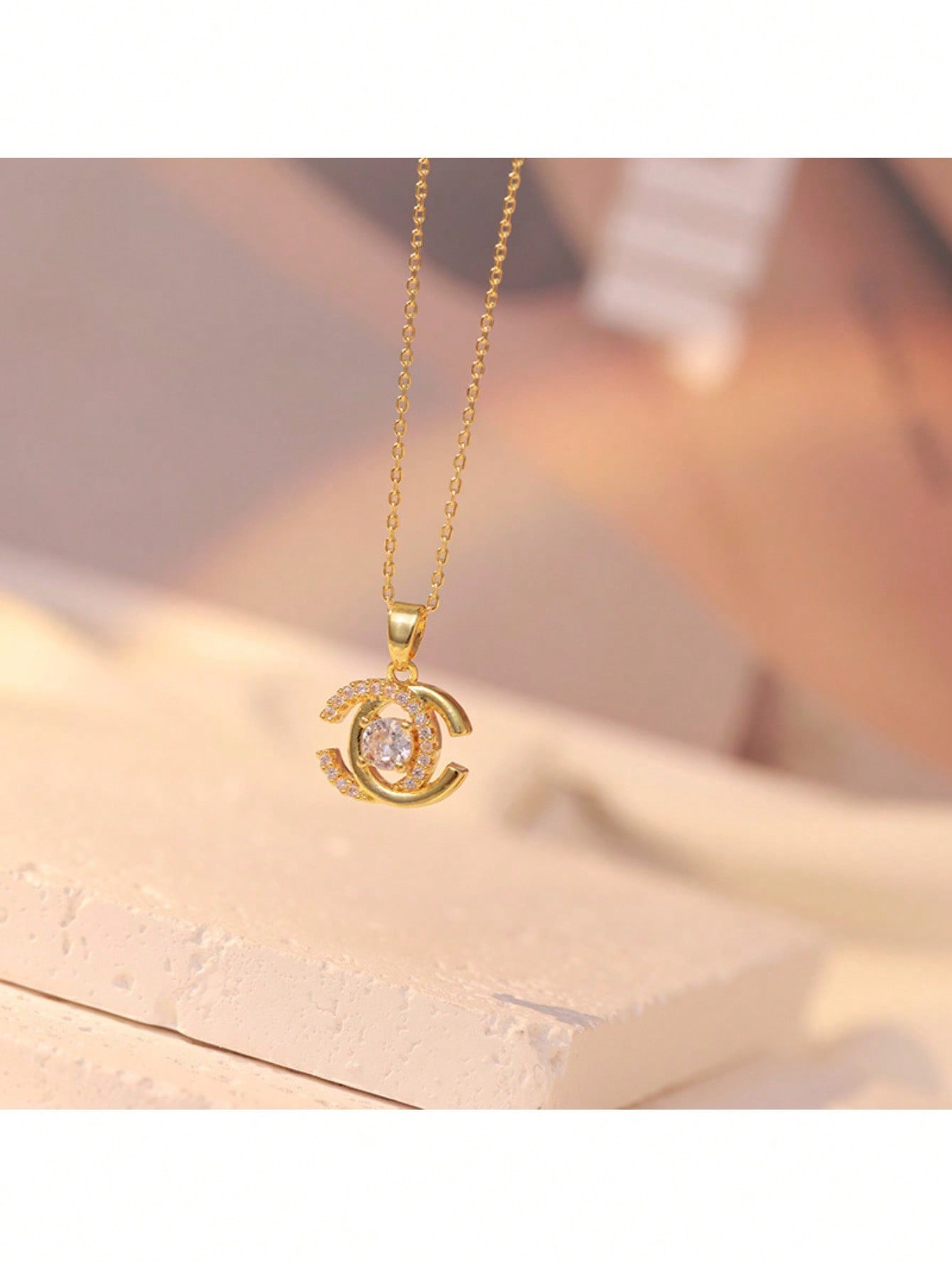 Elegant Gold Tone Interlocking C Pendant Necklace With Sparkling Cubic Zirconia – Luxury-Inspired Design Featuring Timeless Interlocking "C" Shape Adorned With Dazzling Stones, High-Quality Gold Finish, Hypoallergenic And Comfortable For Everyday Wear, Pe