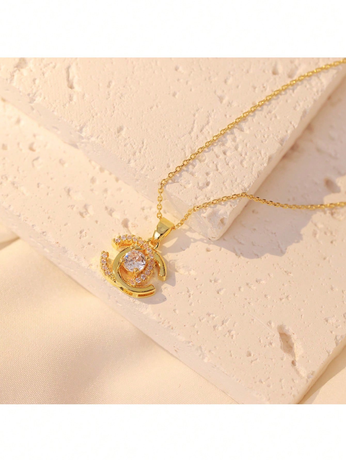 Elegant Gold Tone Interlocking C Pendant Necklace With Sparkling Cubic Zirconia – Luxury-Inspired Design Featuring Timeless Interlocking "C" Shape Adorned With Dazzling Stones, High-Quality Gold Finish, Hypoallergenic And Comfortable For Everyday Wear, Pe
