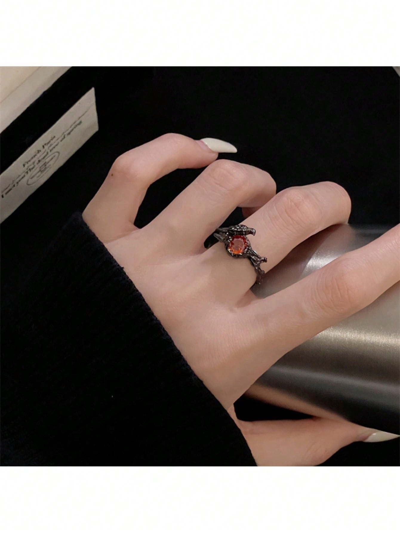 Gothic Black Bird And Red Gemstone Ring – Unique Adjustable Statement Ring Featuring Detailed Black Metal Bird Perched On Nest Setting With Sparkling Red Gemstone Center, Intricate Vintage-Inspired Design, Comfortable Adjustable Band For Various Finger Si