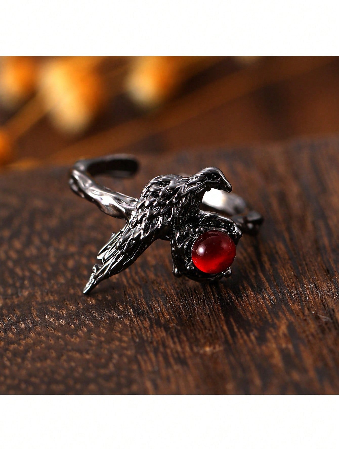 Gothic Black Bird And Red Gemstone Ring – Unique Adjustable Statement Ring Featuring Detailed Black Metal Bird Perched On Nest Setting With Sparkling Red Gemstone Center, Intricate Vintage-Inspired Design, Comfortable Adjustable Band For Various Finger Si