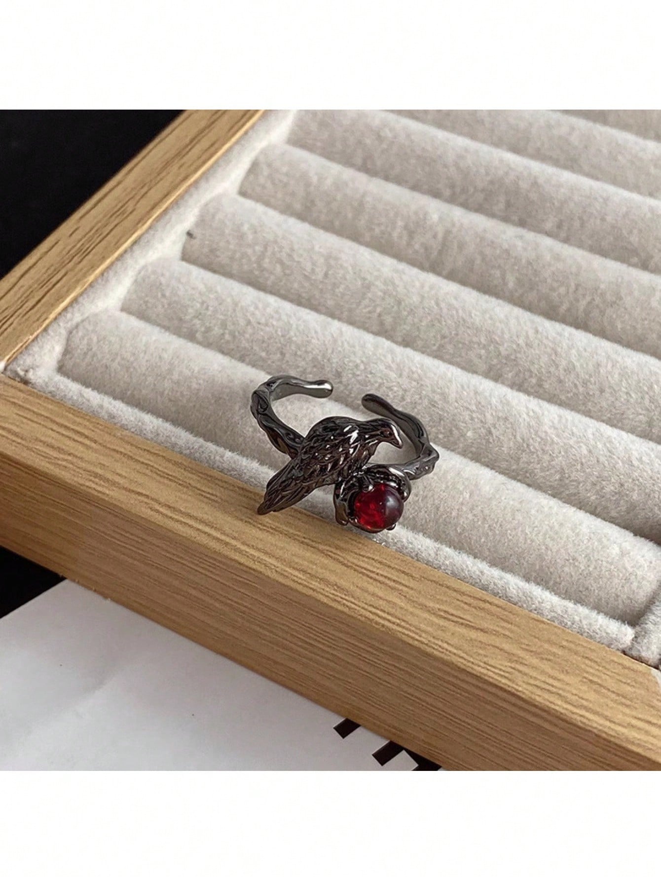Gothic Black Bird And Red Gemstone Ring – Unique Adjustable Statement Ring Featuring Detailed Black Metal Bird Perched On Nest Setting With Sparkling Red Gemstone Center, Intricate Vintage-Inspired Design, Comfortable Adjustable Band For Various Finger Si