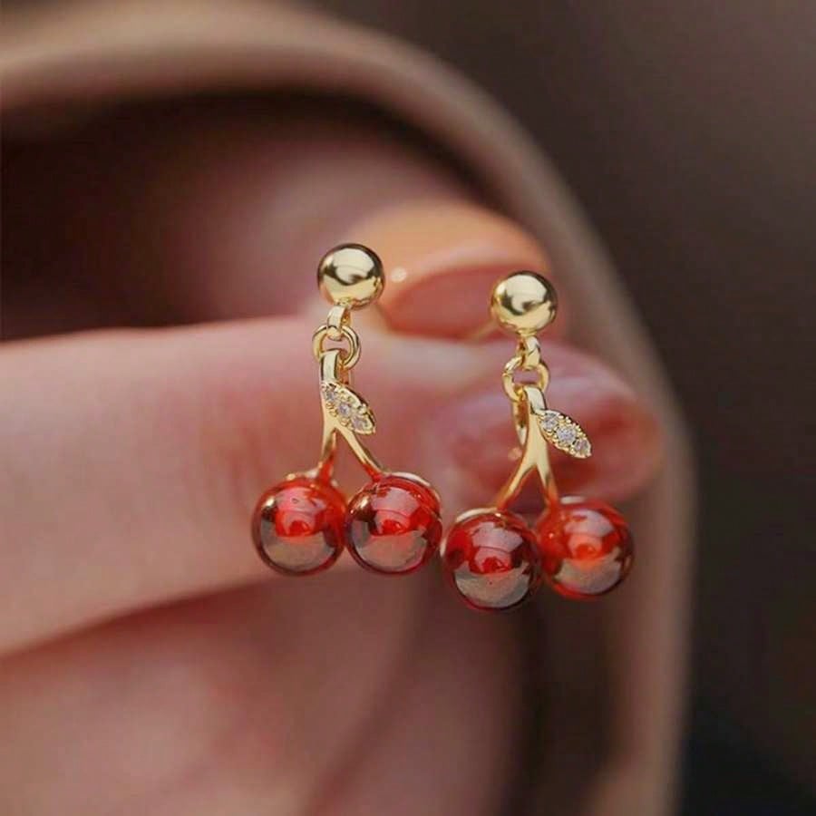 Dainty Gold Tone Double Cherry Drop Earrings: Adorable And Playful Earrings Featuring Two Realistic Red Cherry Charms With Subtle Green Leaf Accents And Sparkling Crystal Details, Crafted With A High-Quality Gold Tone Finish For A Touch Of Elegance, Light