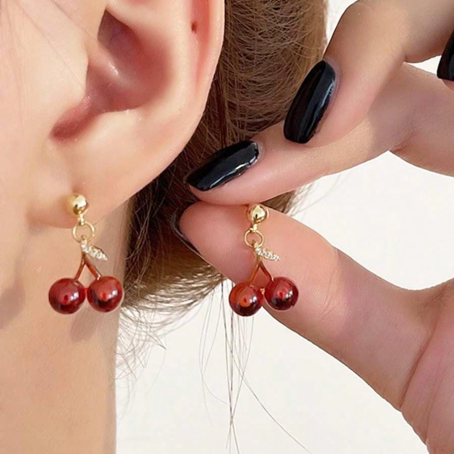 Dainty Gold Tone Double Cherry Drop Earrings: Adorable And Playful Earrings Featuring Two Realistic Red Cherry Charms With Subtle Green Leaf Accents And Sparkling Crystal Details, Crafted With A High-Quality Gold Tone Finish For A Touch Of Elegance, Light